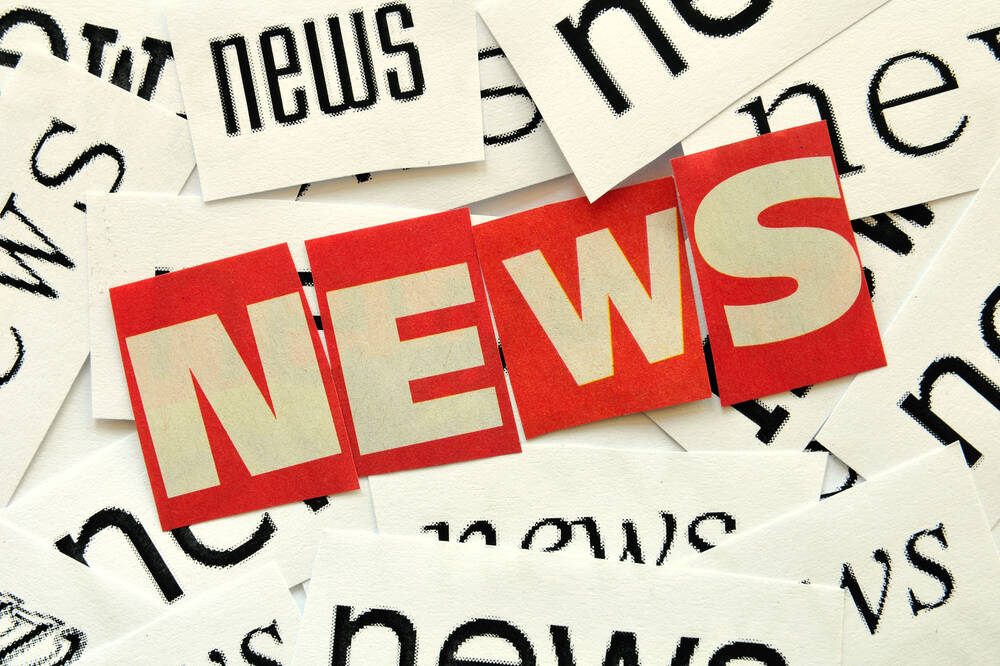 news,,,red,and,white,letters,on,letterings