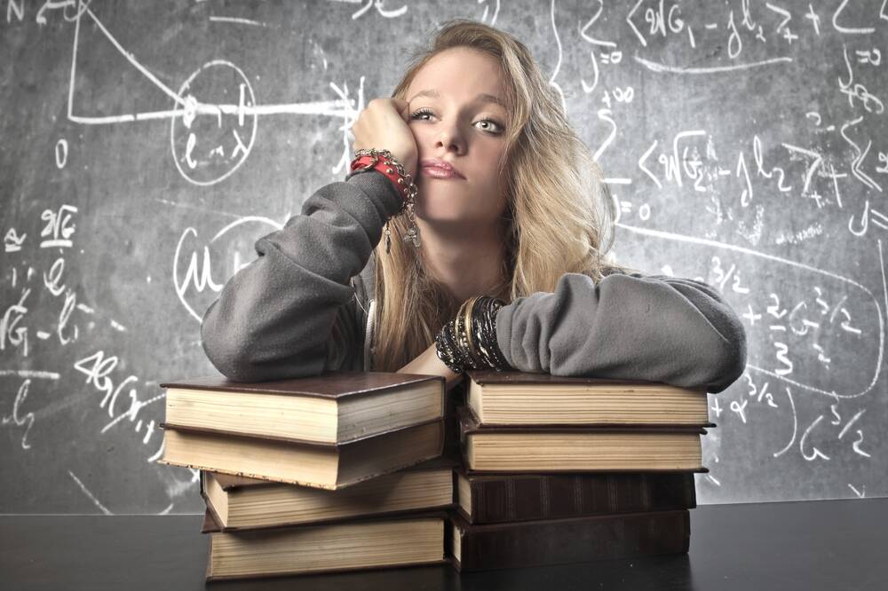 thinking,girl.,background,blackboard,with,maths