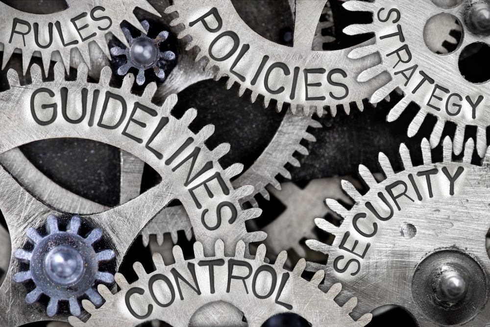 macro,photo,of,tooth,wheel,mechanism,with,guidelines,,control,,policies,