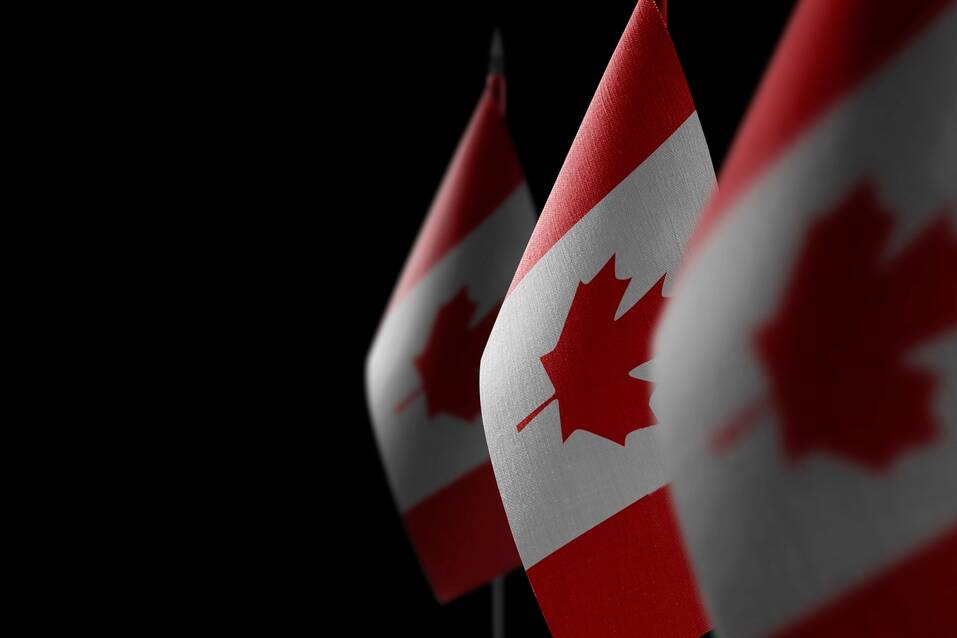 small,national,flags,of,the,canada,on,a,black,background