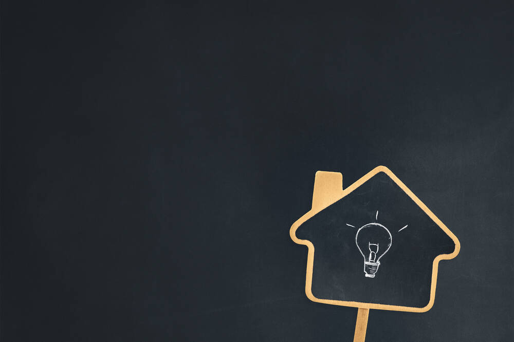 a,house,sign,chalkboard,with,a,light,bulb,symbol,showing