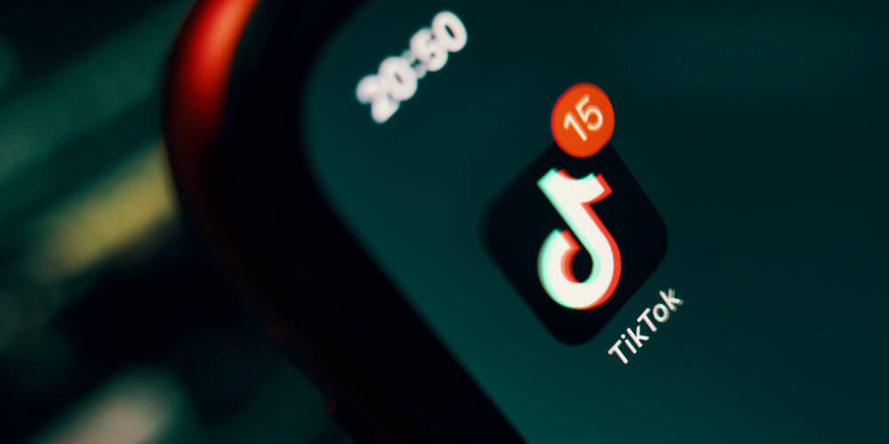 close up,the,tiktok,icon,with,notification,on,the,iphone,screen.