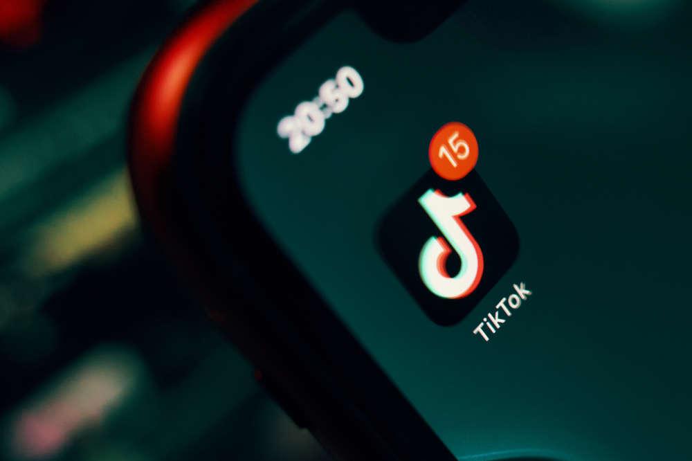 close up,the,tiktok,icon,with,notification,on,the,iphone,screen.