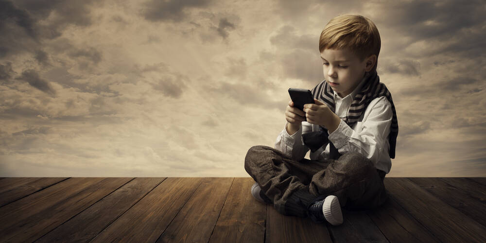 child,using,mobile,phone,,little,kid,boy,playing,cellular,smart