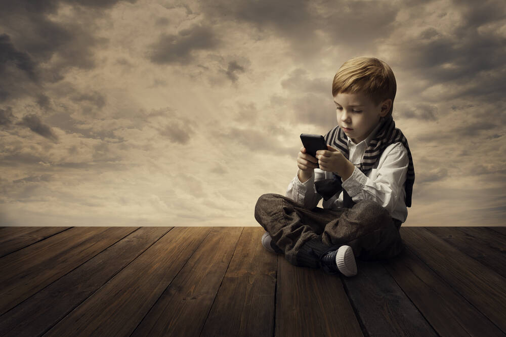 child,using,mobile,phone,,little,kid,boy,playing,cellular,smart