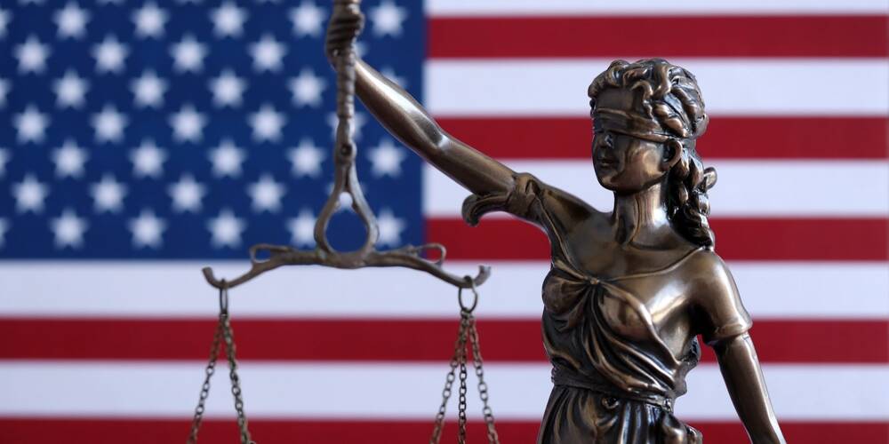 united,states,of,america,flag,with,statue,of,lady,justice